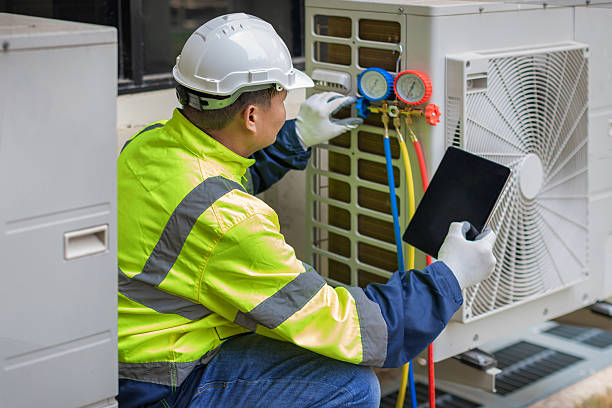 Professional Hvac technician working in Semmes, AL